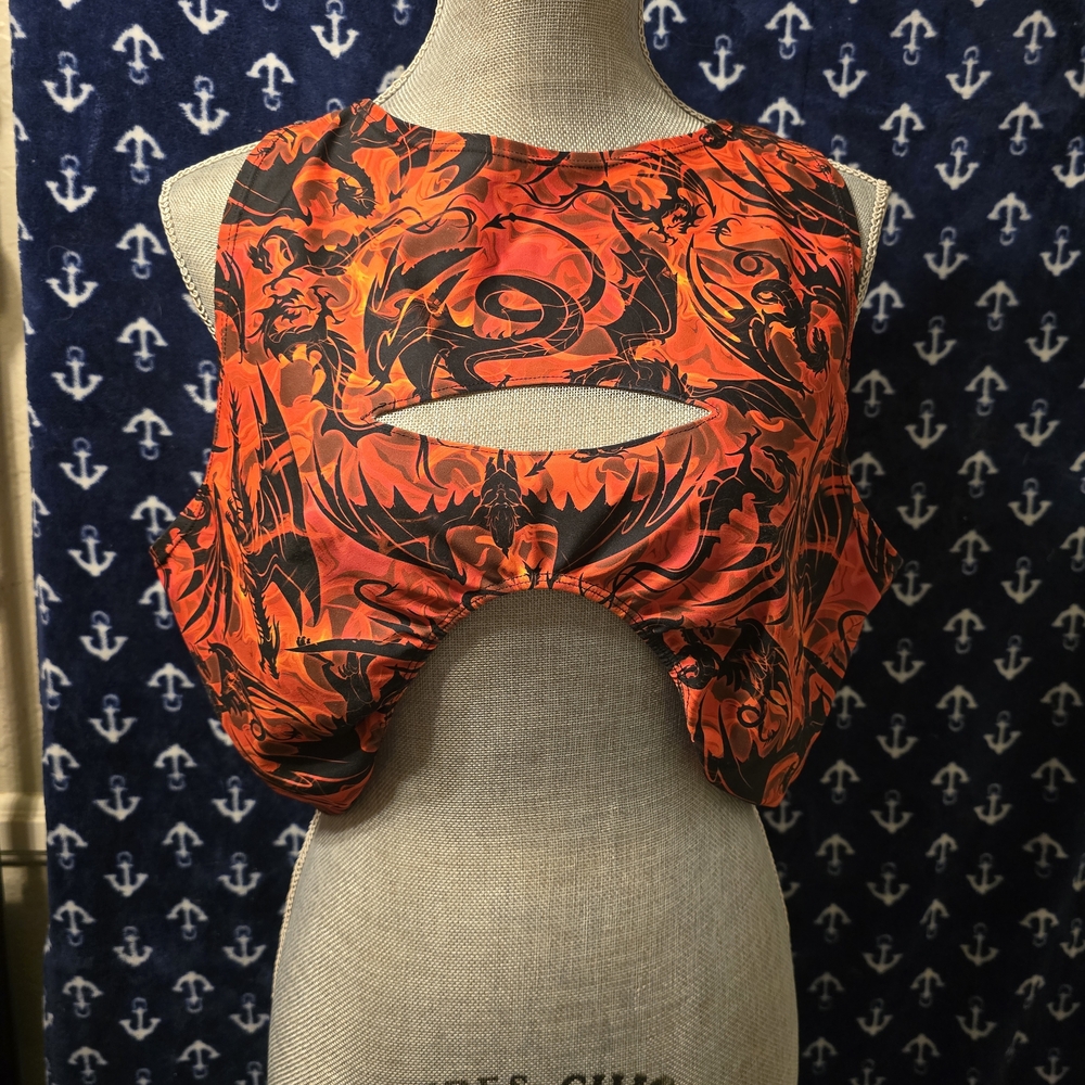 Orange Sleeveless Crop Top with Cut Out Design